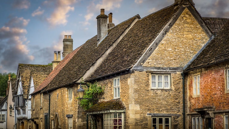 A terrace of stone cottages in Lacock village, Wiltshire